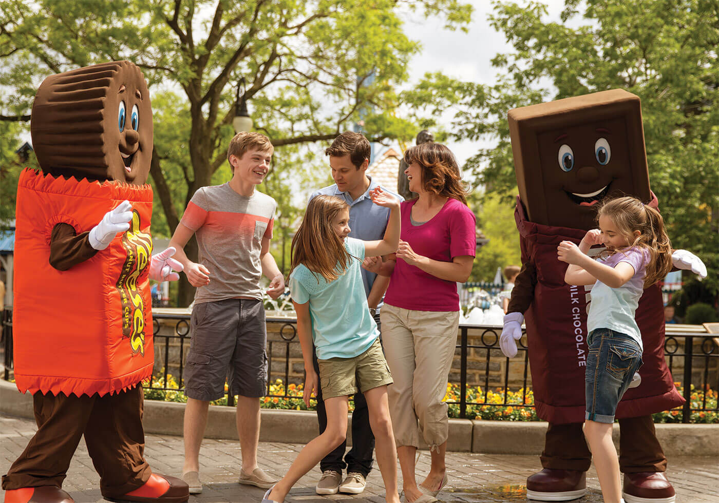 family having fun with Hershey's costume characters