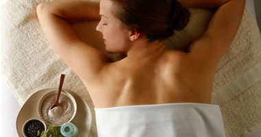 Woman waiting for a massage with chocolate treatments
