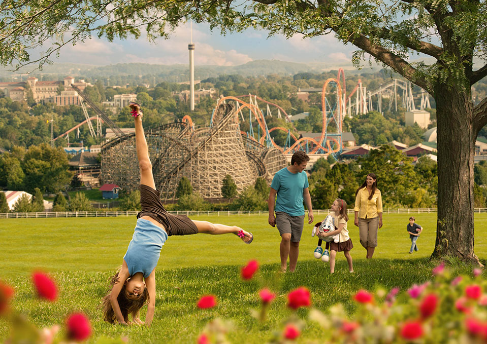 girl cartwheeling on hill overlooking Hershey, PA