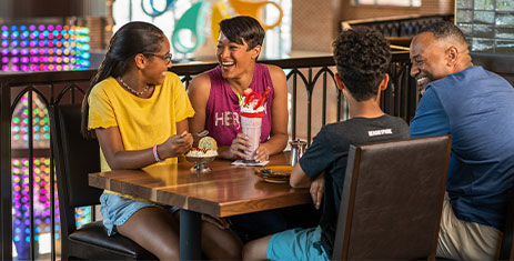 Family enjoying milkshakes at The Chocolatier.