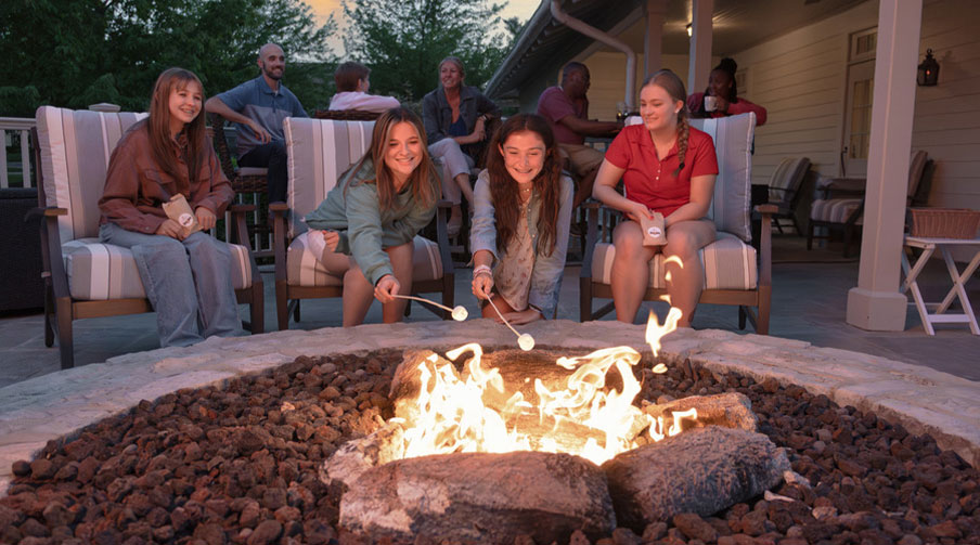 Friends gathered around the firepit