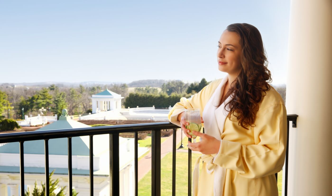 Woman on balcony at the spa