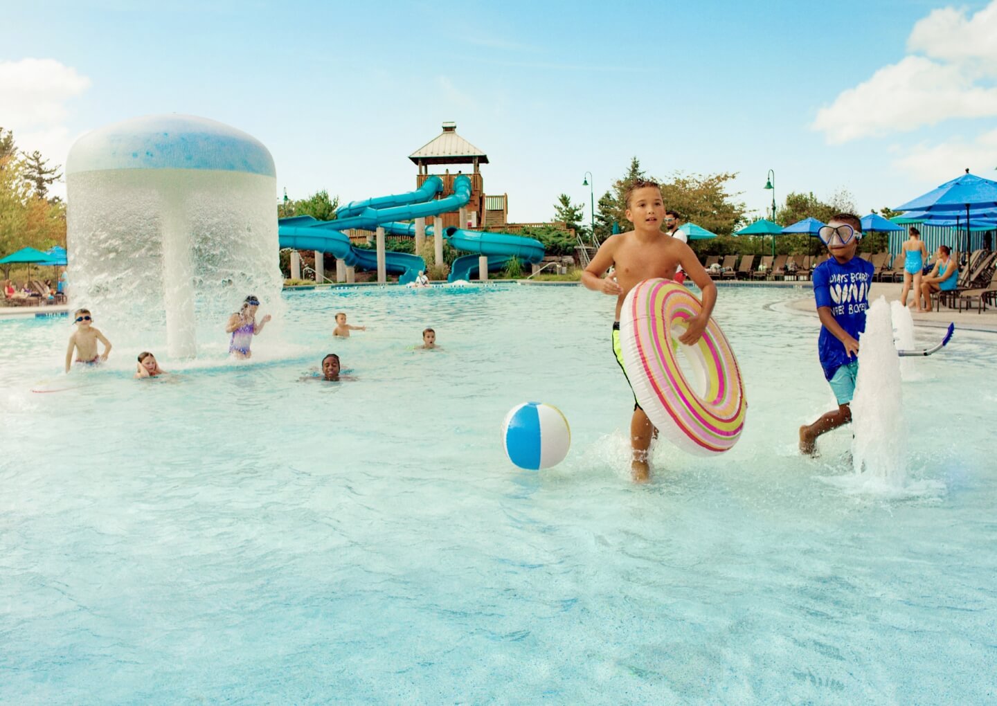 Kids playing in The Hotel Hershey outdoor pool
