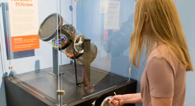 Child interacting with special exhibit